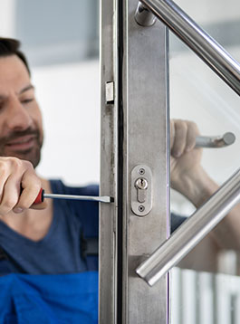 technician fixing the door